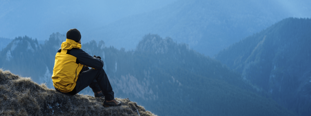 man-on-mountain-600-1-1024x384